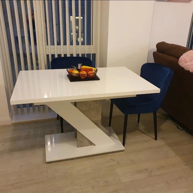 Customer dining room featuring an extendable table from Pure Home Design.