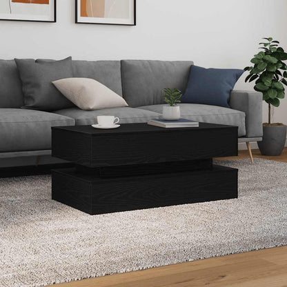 Stylish black coffee table placed in a bright living room, matching modern sofa furniture and neutral décor.