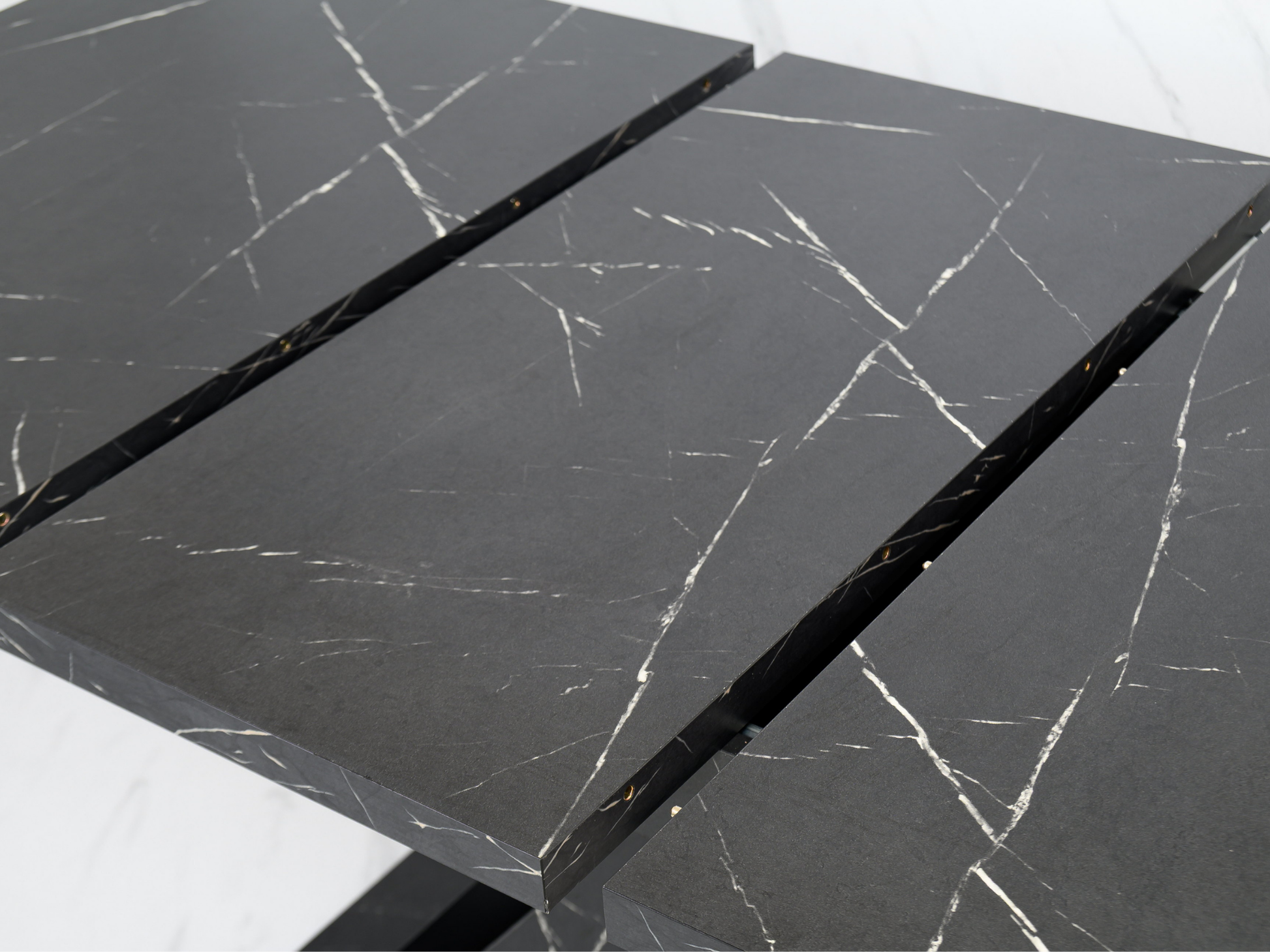 Close-up of Black Royal Marble Effect tabletop showing refined veining and smooth finish