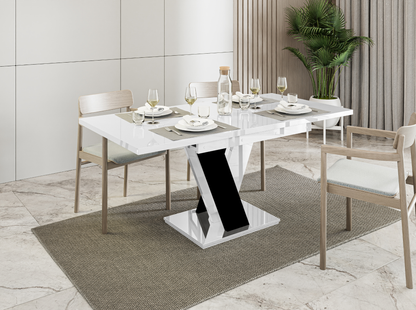 Compact MASIV dining table in white gloss with striking black gloss stand.
