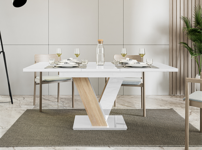 Compact white gloss dinner table MASIV with warm Sonoma oak X-shaped stand.