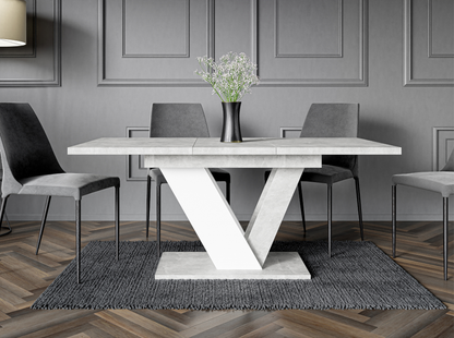Dining room with a modern table and chairs in a gray interior setting