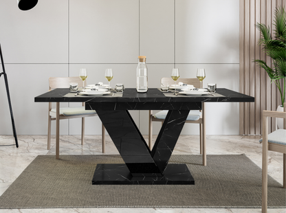 Luxury extendable dining table DUBAI with black marble top and glossy black stand.