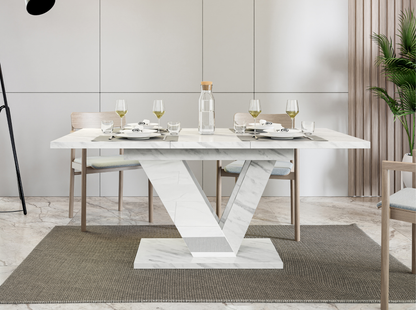 Modern extendable dining table DUBAI with white marble effect surface.