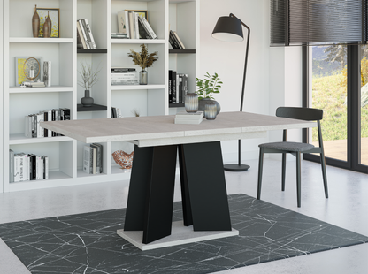 Contemporary 120–160 cm extendable dining table with grey concrete-effect top and matte black pedestal legs.
