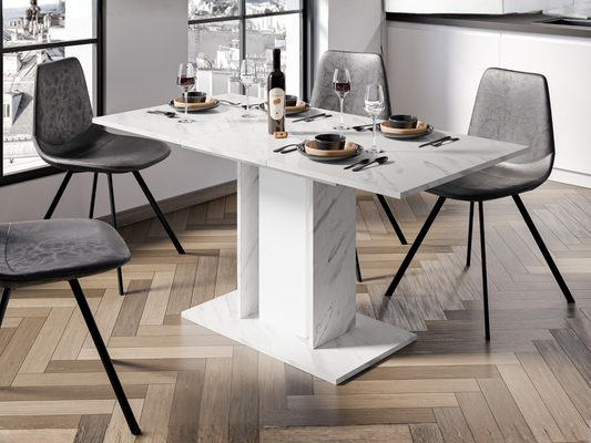 Extendable dining table with White Bianco Marble Effect tabletop, white central column and marble effect side columns, styled with chairs