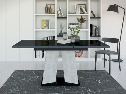 Stylish 120–160 cm extendable dining table in black gloss finish with sturdy concrete effect legs.