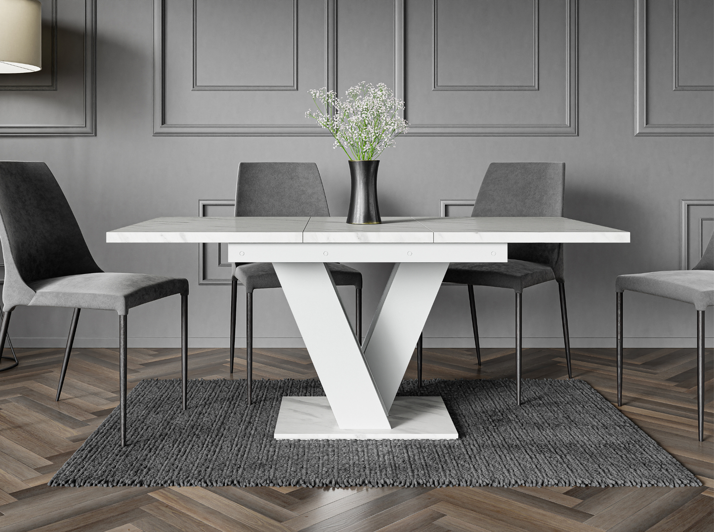 Glamour dining table with white marble top and matching white V-shaped stand.