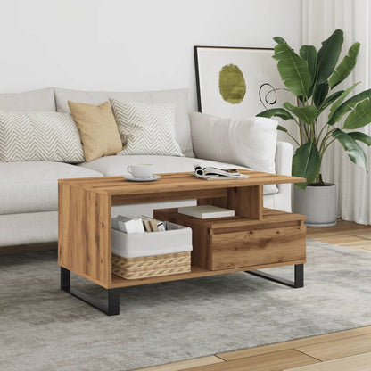 Stylish oak coffee table with black metal frame in a modern living room, combining warmth and industrial design.
