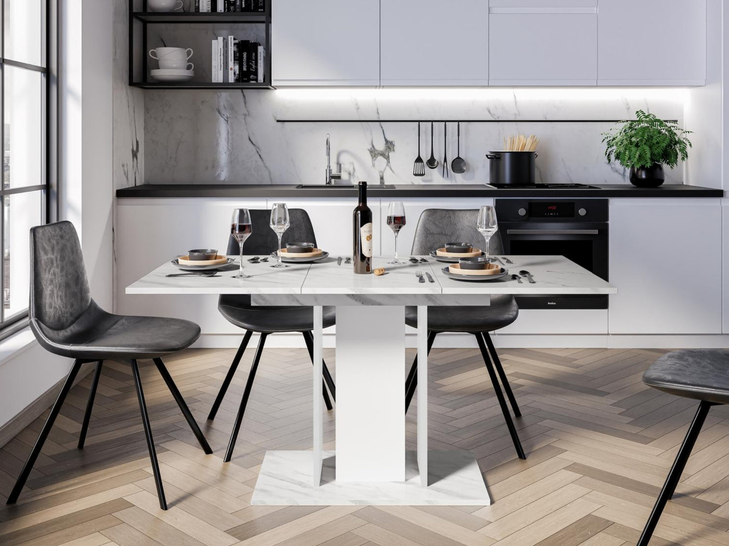 Modern extending dining table with White Bianco marble effect top and white pedestal columns in a bright dining space
