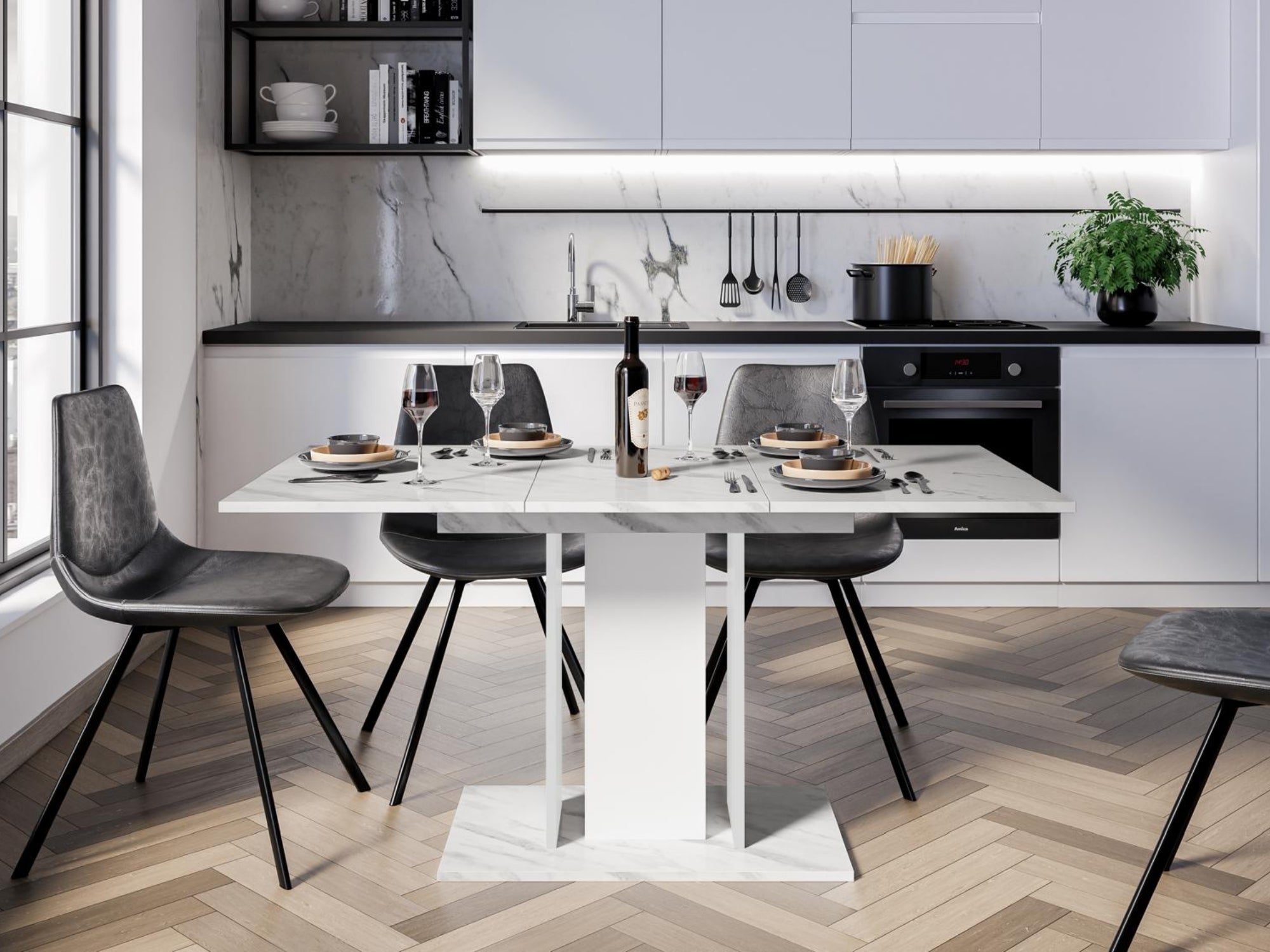 Modern extending dining table with White Bianco marble effect top and white pedestal columns in a bright dining space

