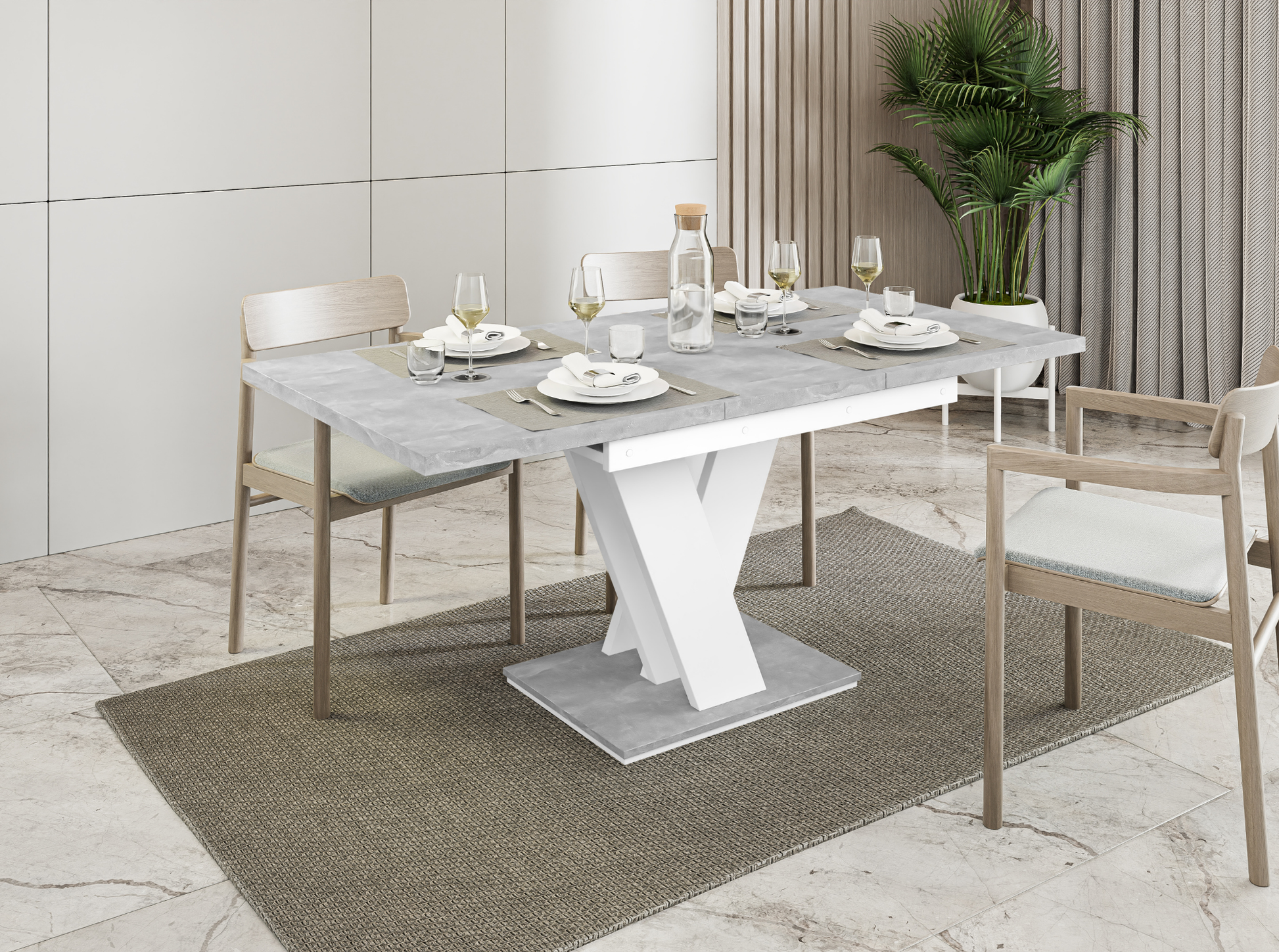 Extendable MASIV dinner table in concrete grey and plain white finish.