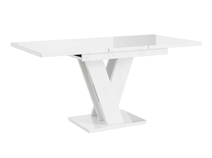 Space-saving MASIV 6 seater dining table with geometric V-shaped base design.