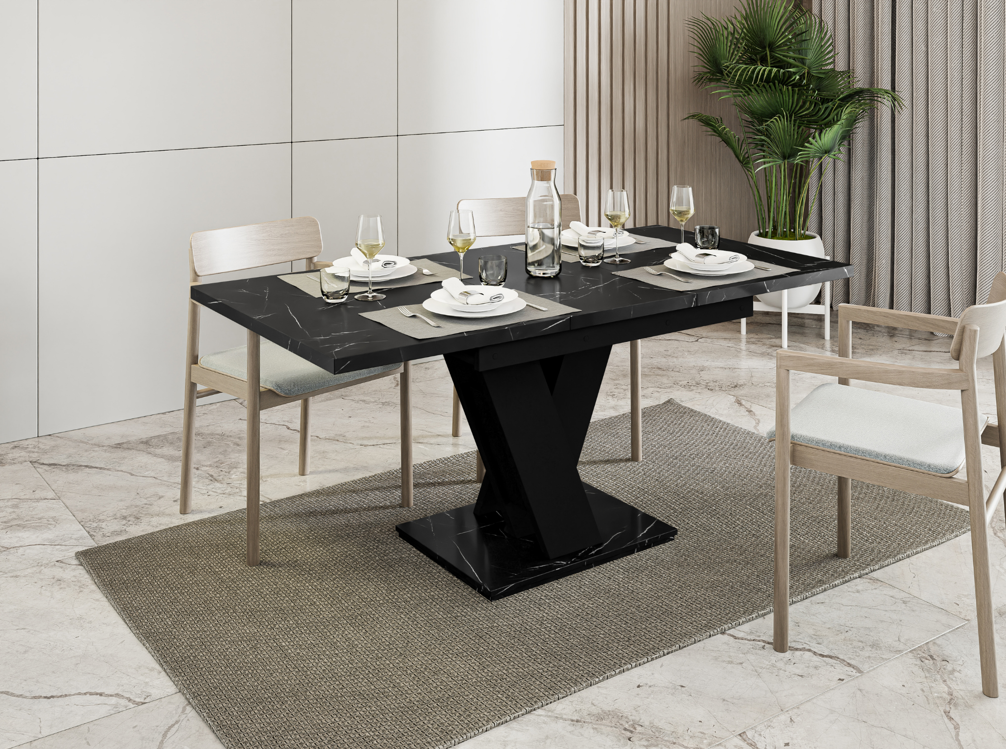 Extendable MASIV dinner table in black royal marble with solid black base.