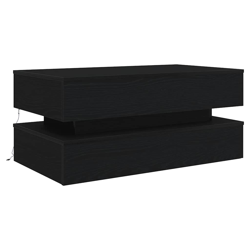 Contemporary black coffee table with layered design and integrated LED light, ideal for modern interiors.