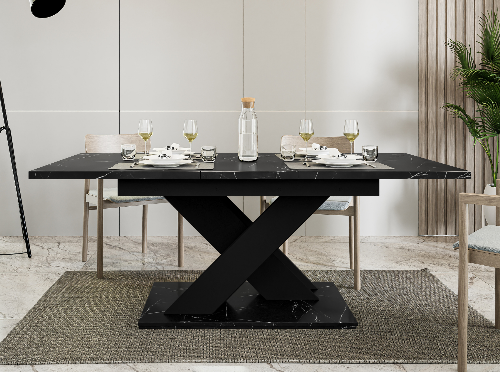 Modern Black Royal Marble dining table with X-shaped black base.