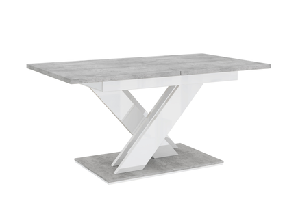Modern dining table with concrete effect top and white gloss X-shaped base.
