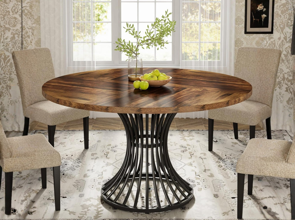 Small round dining table with wood tabletop and metal pedestal base in stylish dining room, modern bistro table design