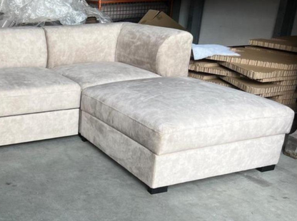 modern beige sofa bed in minimalist room setting, velvet fabric, L-shaped corner layout