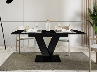 MASIV extendable dining table in black gloss, perfect for small spaces.