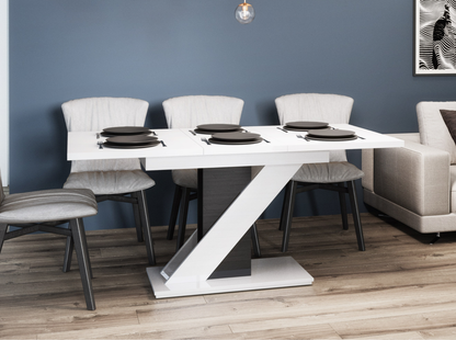 Modern extendable dining table MAVEA in white gloss with black gloss base.