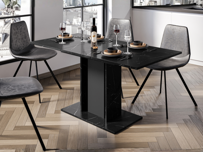 Extendable dining table WOOD MINI with Black Royal Marble Effect top and slim black columns, styled with dining chairs