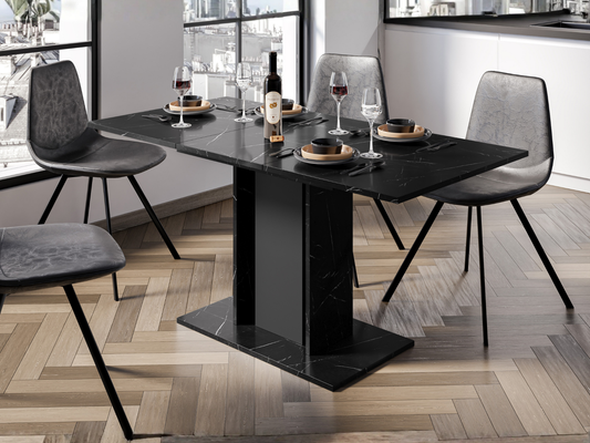 Extendable dining table WOOD MINI with Black Royal Marble Effect top and slim black columns, styled with dining chairs