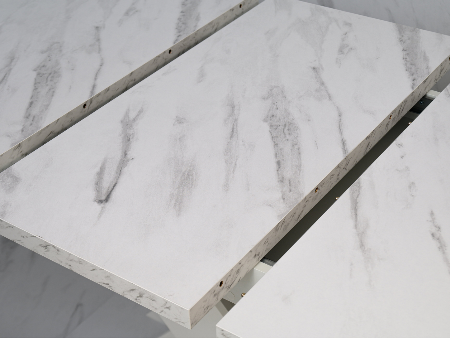 Close-up of White Bianco Marble Effect tabletop showing elegant veining and smooth finish