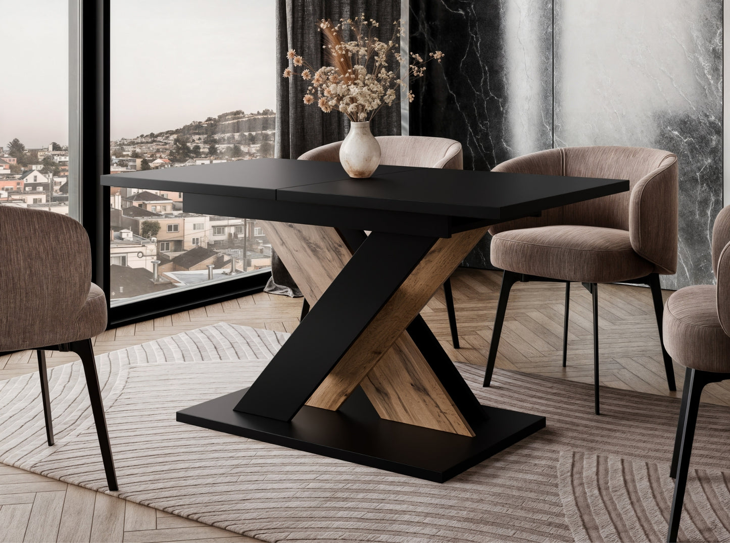 TOXX extending dining table with a black tabletop and wotan oak effect X-shaped base placed in a modern dining room setting, upholstered dining chairs arranged around the table on a rug.