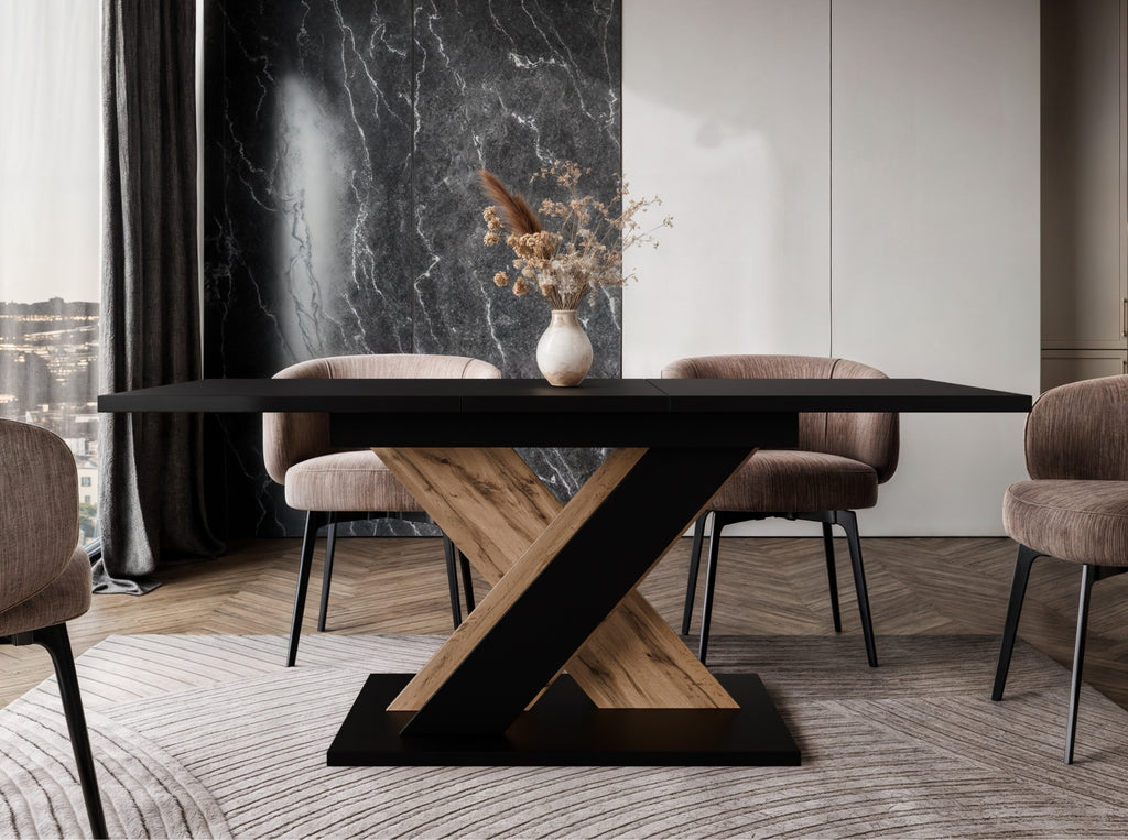 Compact extending dining table TOXX with black top and wotan oak effect pedestal base, size 120–160 × 80 × 75 cm, designed to comfortably seat 4 to 6 people.