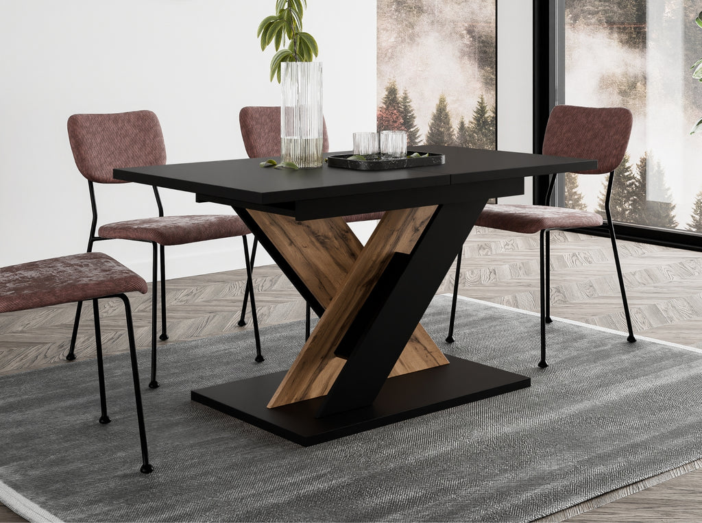 Modern kitchen table TOXX featuring a durable black rectangular tabletop and wotan oak effect X-frame pedestal base, extending function ideal for contemporary kitchens and dining areas.