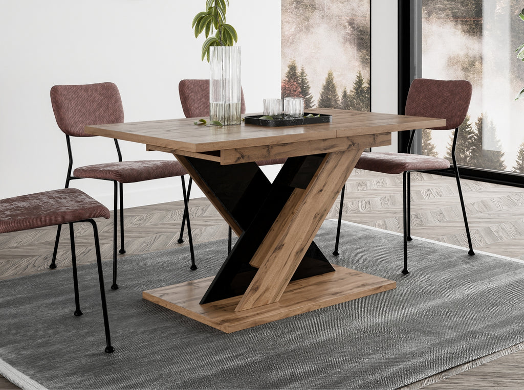 Modern kitchen table TOXX featuring a durable wotan oak effect tabletop and high gloss black X-frame pedestal base, extending function ideal for contemporary kitchens and dining areas.