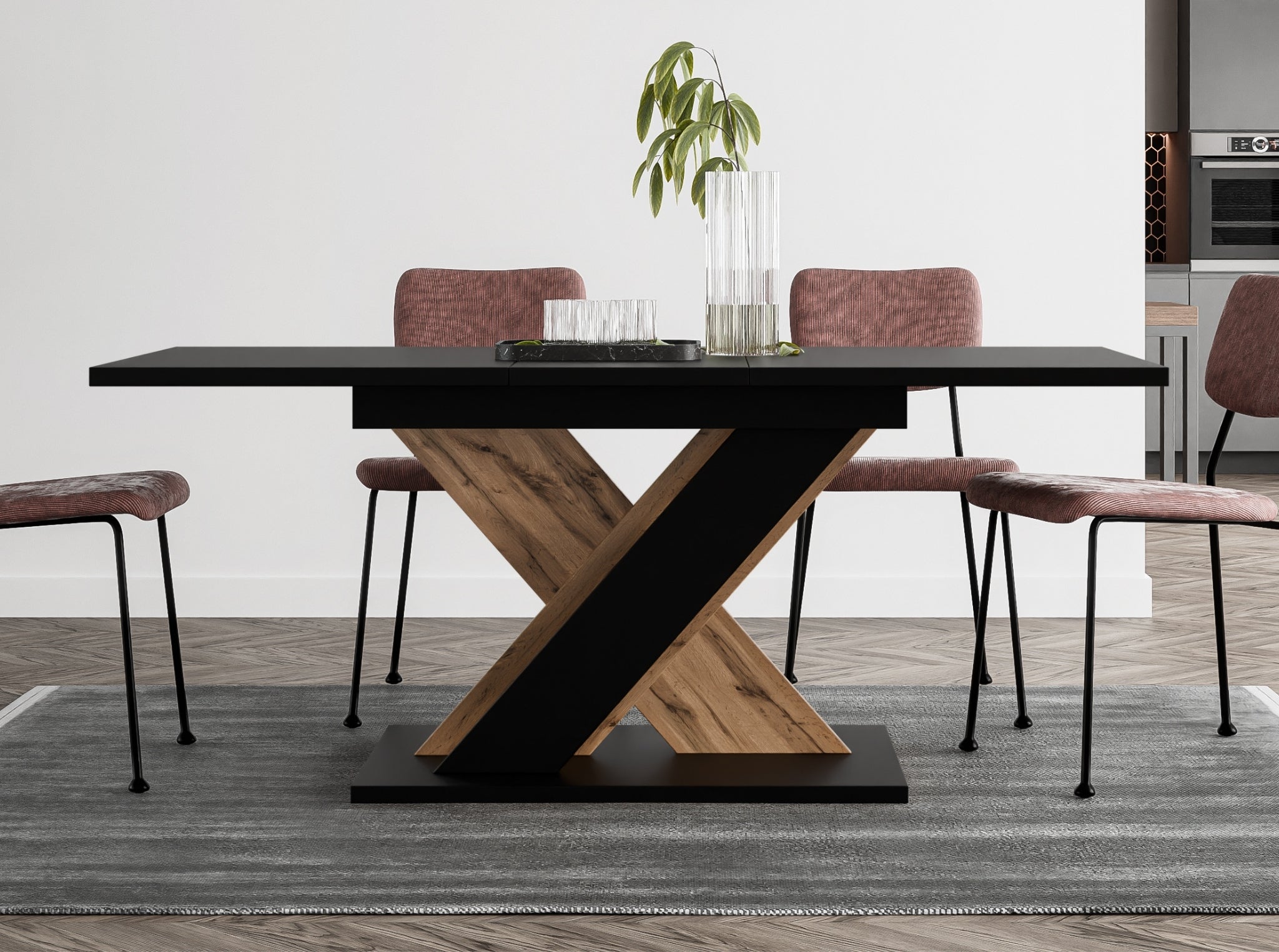 Space-saving extending dining table TOXX with black tabletop and wotan oak effect X-shaped base, compact design extending from 120 to 160 cm, suitable for modern interiors and smaller dining rooms.
