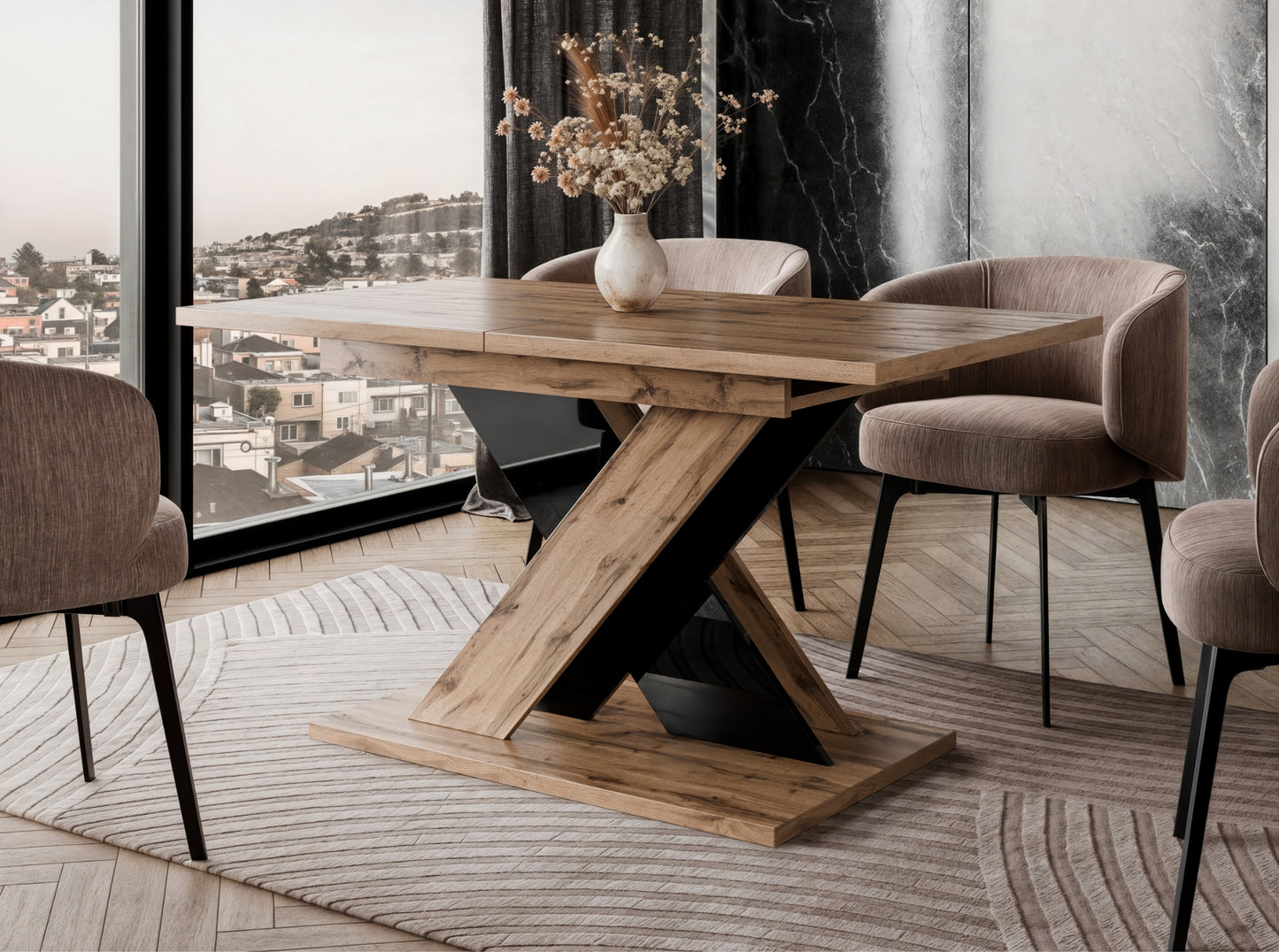 TOXX extending dining table with a wotan oak effect finish placed in a modern dining room setting, black gloss X-shaped pedestal base, upholstered dining chairs arranged around the table on a rug.